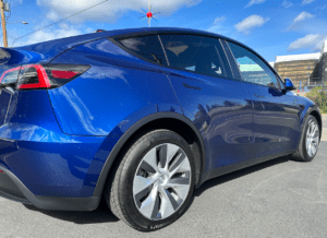 This photo is of a blue Tesla that has had the ceramic coating Santa Rosa Auto Sport Detailing treatment. 