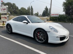 This photo is of a white Porsche with Ceramic Coating North Bay